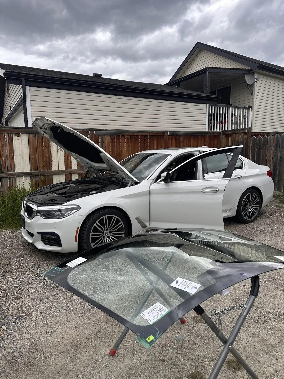 Windshield replacement by Fiolent Mobile Autoglass at a customer's driveway in Calgary