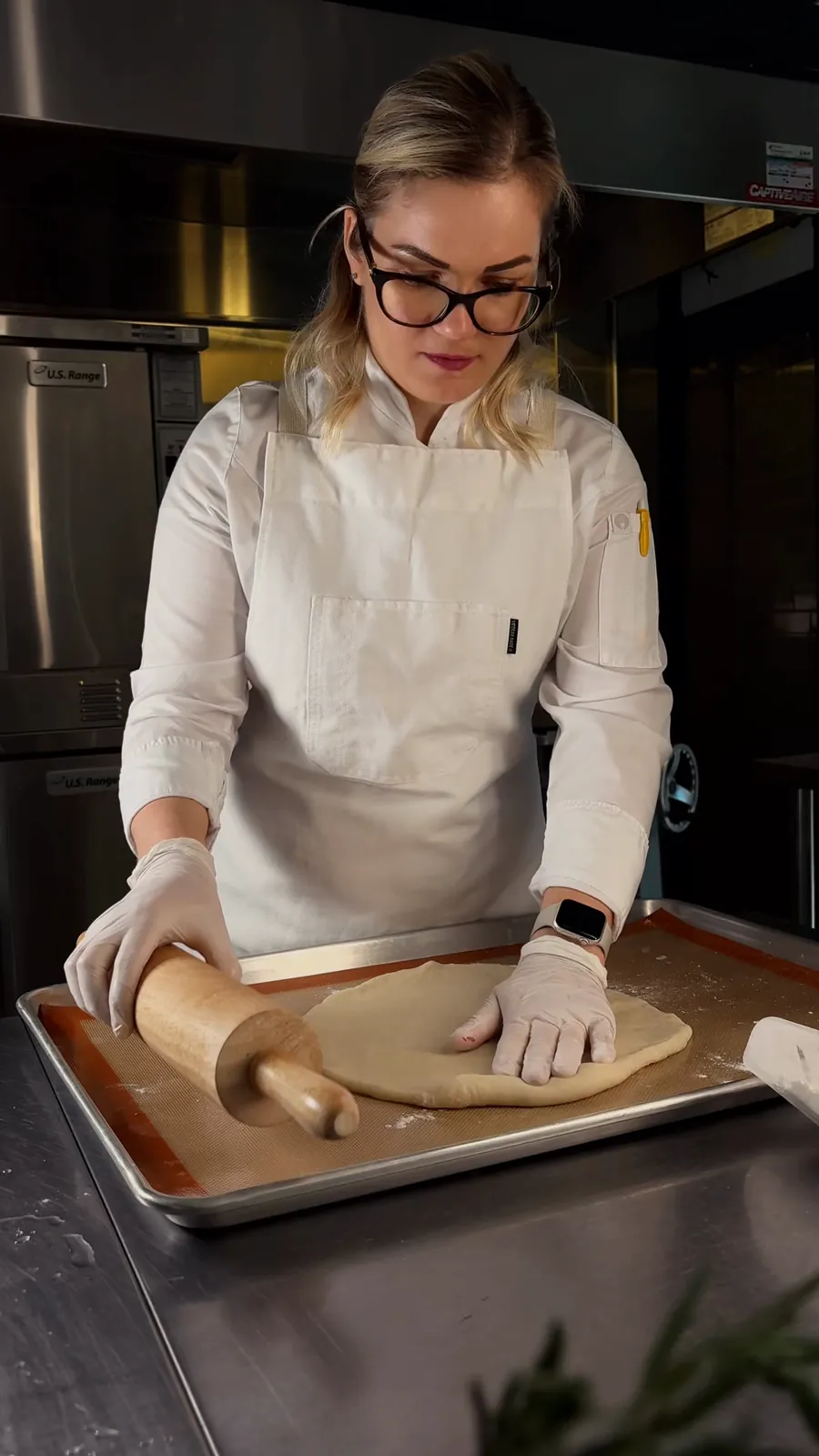 The chef rolling galette dough